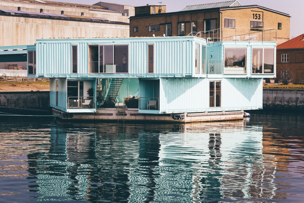 Shipping container home by the water.