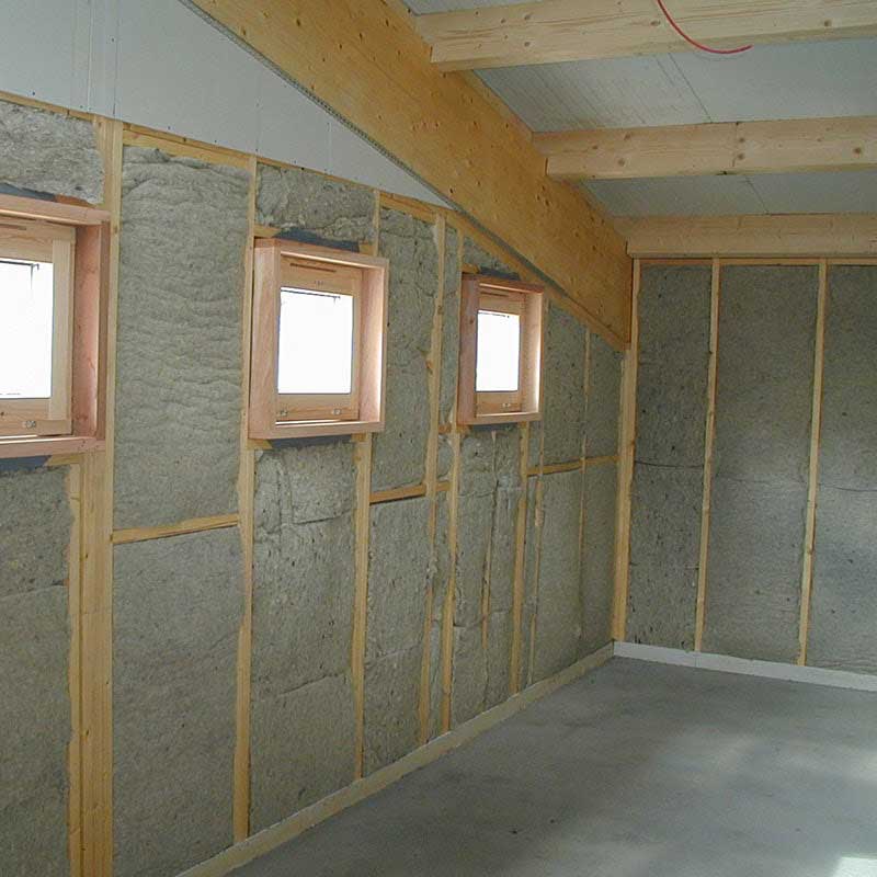 Internal wall insulation in a loft.