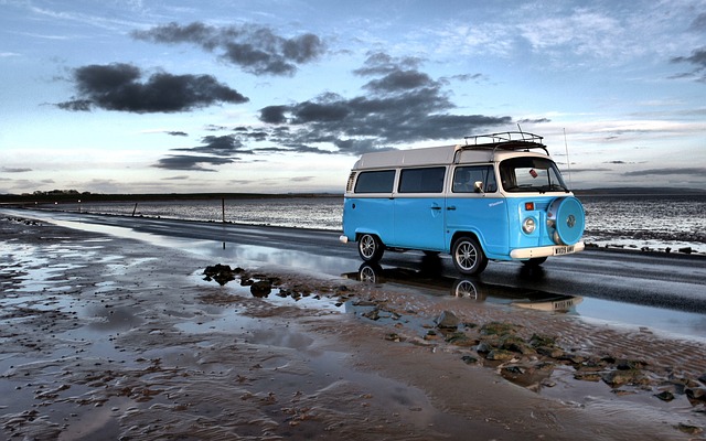 Campervan travelling by the sea